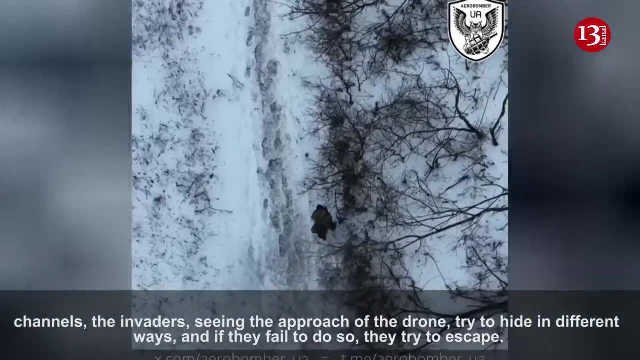 The moment the drone tracks the Russian soldiers running and looking for a place to hide