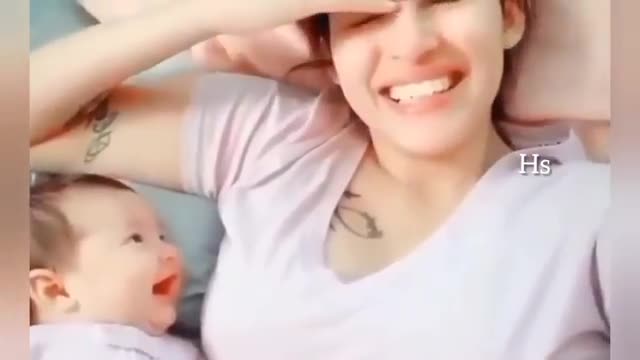 Adorable_baby_looking_at_her mom😍