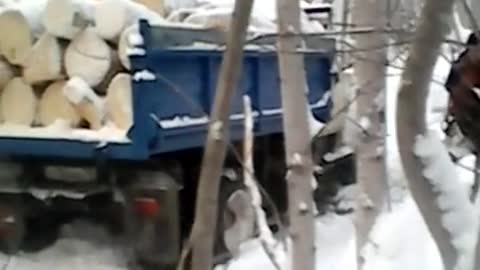 Loaded Truck stuck in snow in Russia