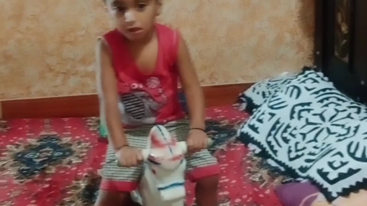 Baby play with horse toy