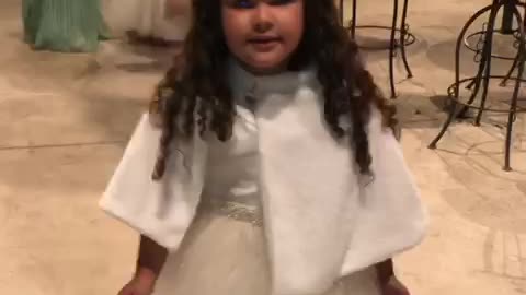 beautiful child dancing at the wedding