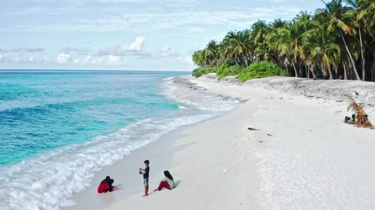 Children swimming in ocean