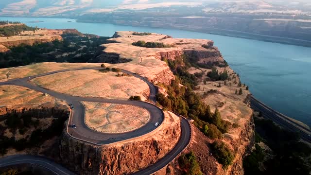 A Long And Winding Road Going Up The Mountain Rock Plateau