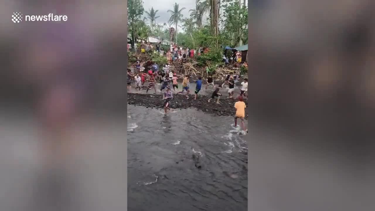 Hilarious moment villagers take part in mass pellet gun battle