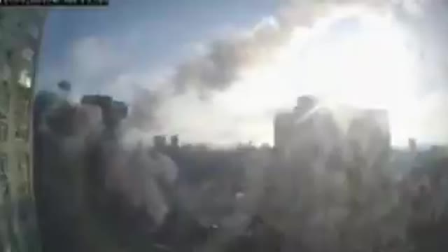 Video shows the moment a high-rise building in Kyiv is hit by a missile