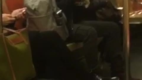 Woman eats ramen on subway train