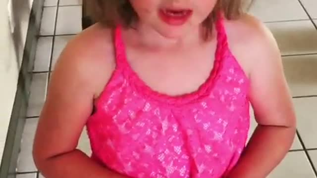 dad helps daughter practice being gentle with foster puppies
