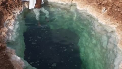 Floating in the salt pools of Siwa Oasis in Egypt