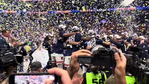 Auburn swag-surfs with SEC Tournament trophy