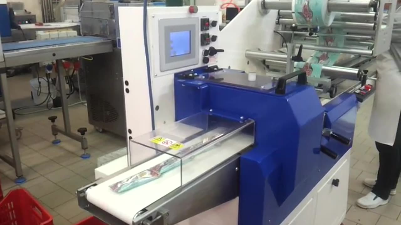 Super-Efficient Flow Wrapping Machine by OPTIMA Weightech