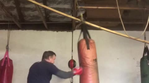 Me punching heavy bag