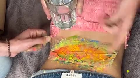 When he pours the water on her