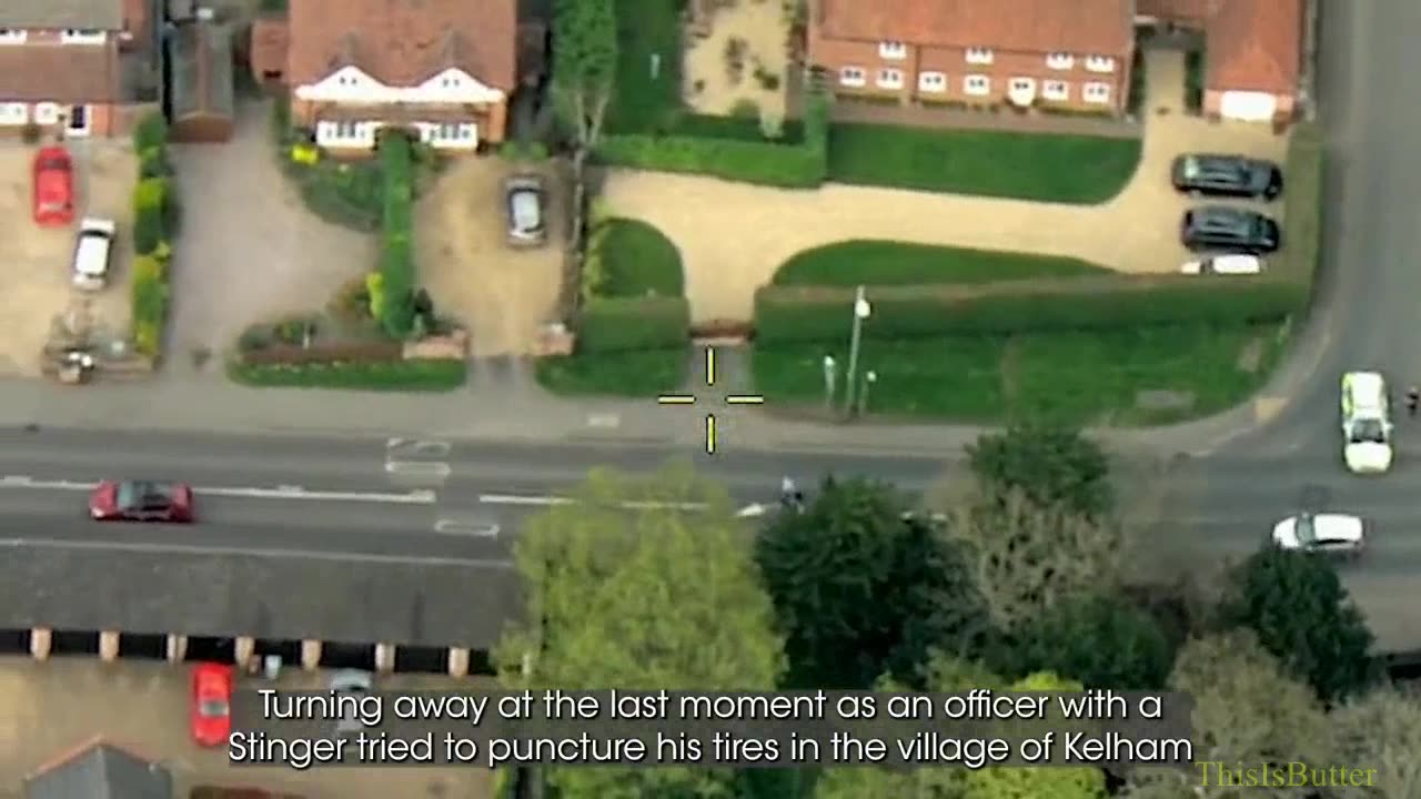 Speeding motorcyclist knocked off bike by police after pulling wheelies during chase