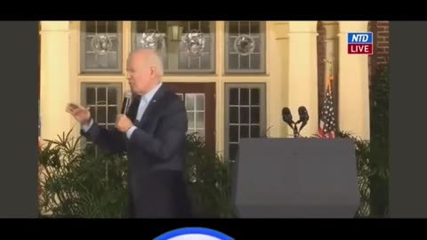 Biden almost falls of Stage !