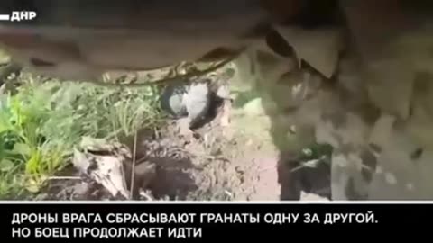 Russian soldier films himself getting hit by a FPV drone and multiple drone dropped grenades