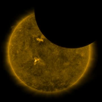 NASA's Solar Dynamics Observatory Catches Lunar Freeze Frame