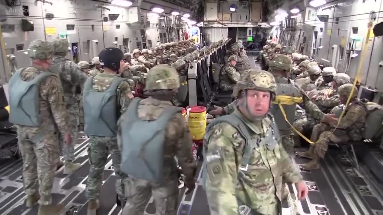 Jumping Out Of Planes: US Army Paratroopers Jump Exercise