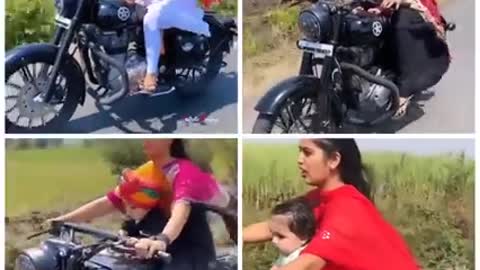 beautiful lady biker with her cute baby.❤️