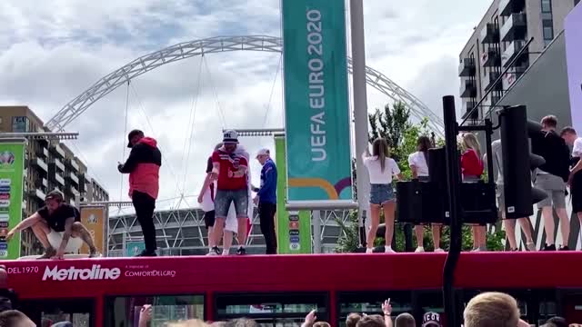 Top this - England fans stand on bus outside Wembley