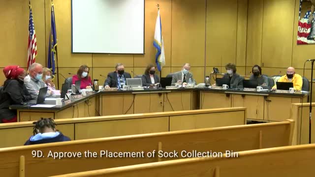 Fox Gives Socks Collection at Mt. Clemens City Hall