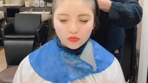 Japanese girl gets a buzzcut in a salon