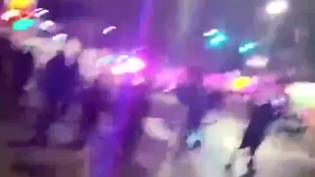 Police vehicle looted. Antifa all over.