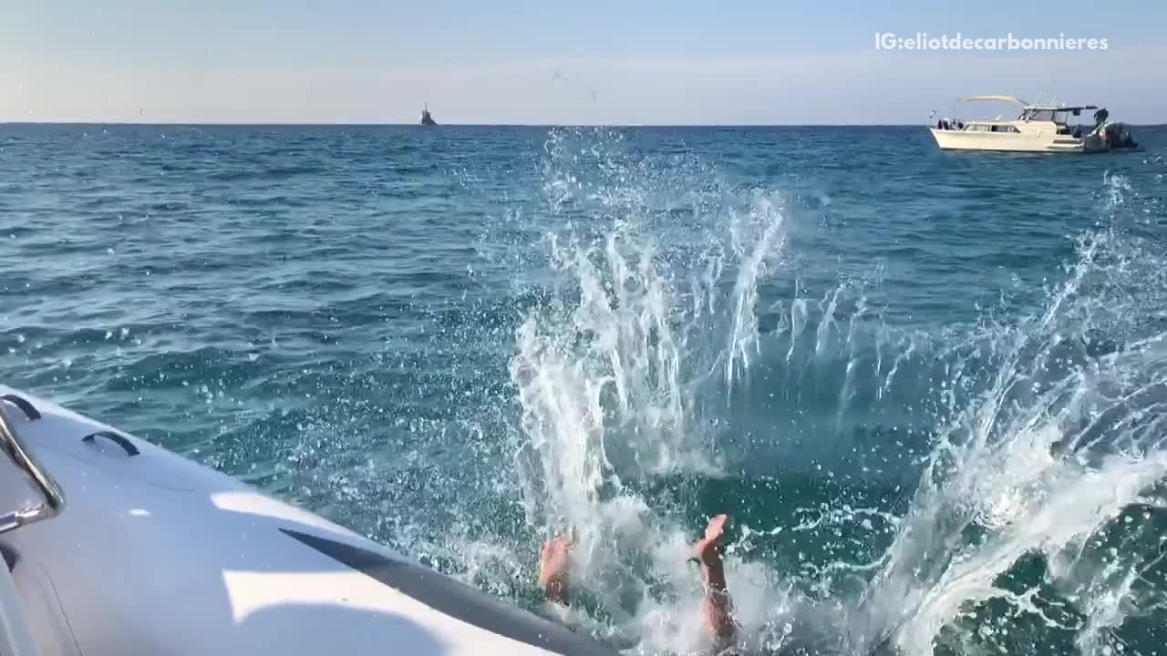 Backflip off boat slaps back