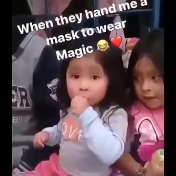 Small Child Demonstrates Magic w/Mask