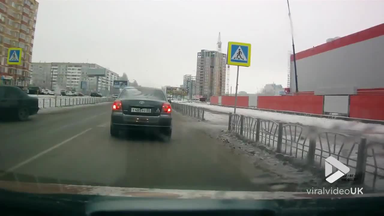 Pedestrians get bumped in air by car