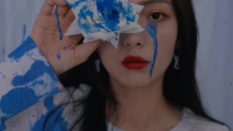 In the blue wind, with roses and flames