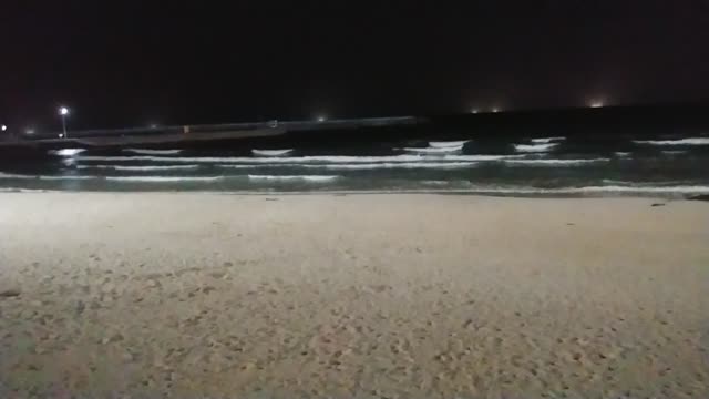 An unusual landscape of waves in the winter night sea