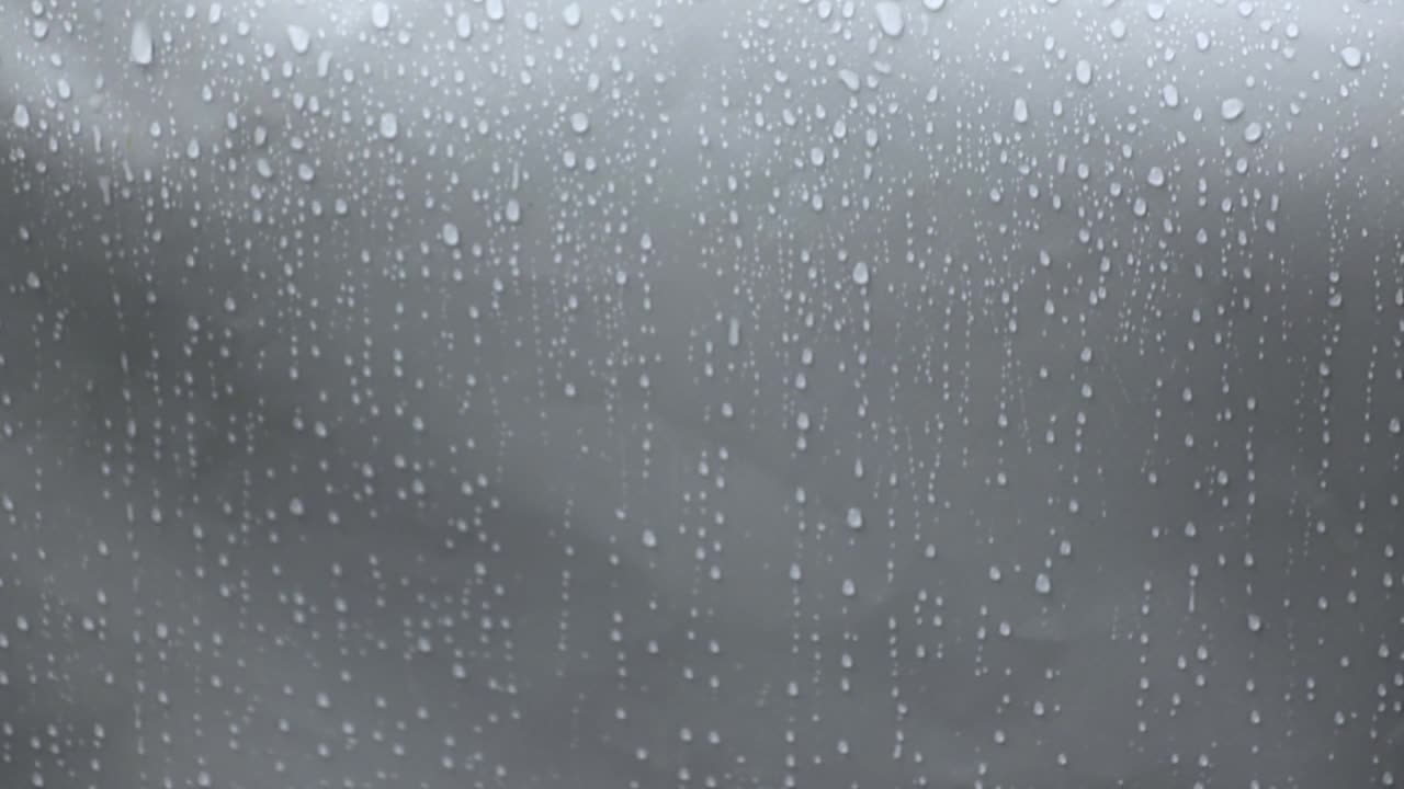 Rainy Window Serenity Immerse in calming sounds of rain while listening to peaceful meditation music