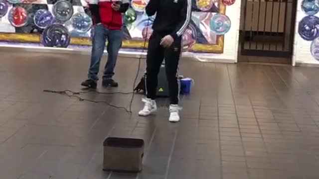 Two guys rapping about grilled cheese in subway