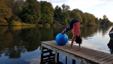 Woman Doing Stretching Exercise With a Yoga Ball