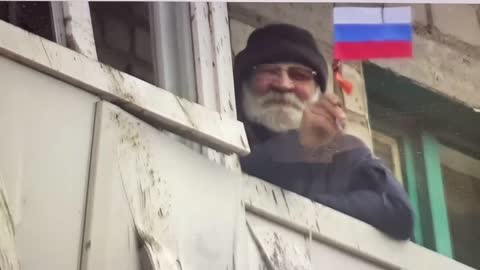 The scene on the balcony in Mariupol