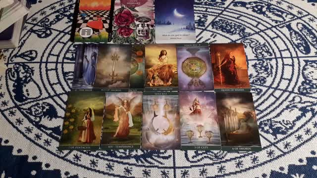 Sagittarius October tarot reading "Let your intuition tell you what needs releasing"