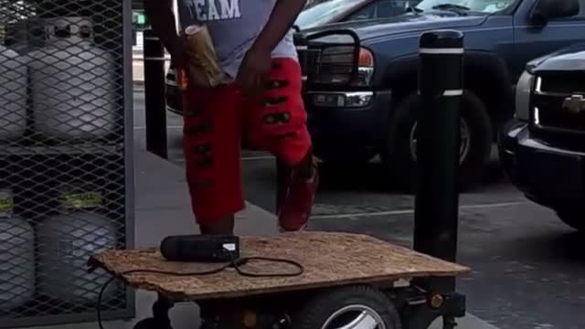 Guy Creates Hoverboard Using Plywood and Electric Wheelchair