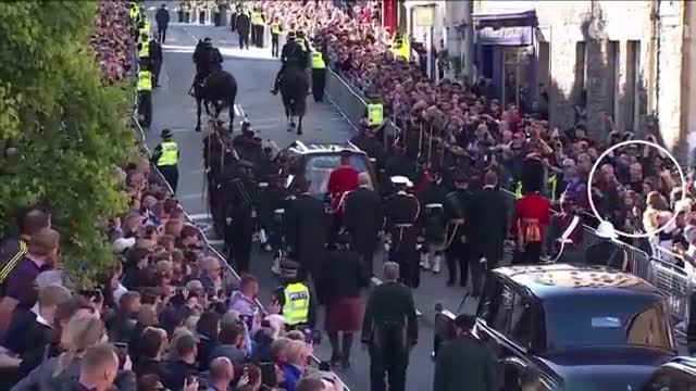 'Andrew, you're a sick man'_ police drag heckler from crowd during Queen's proce