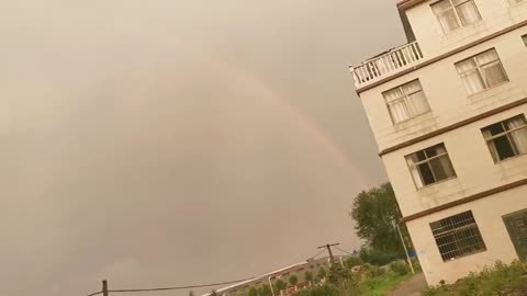 The rainbow after the storm is very beautiful