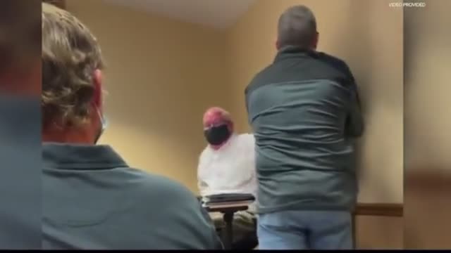 A school board member physically attacked a parent at a school board meeting after the parent raised concers over the mask mandate