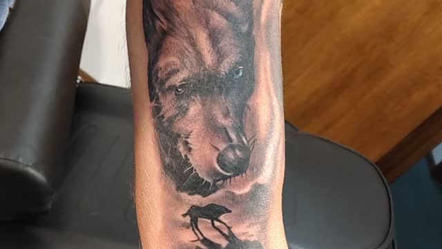 Shoulder tattoo bear wolf raven