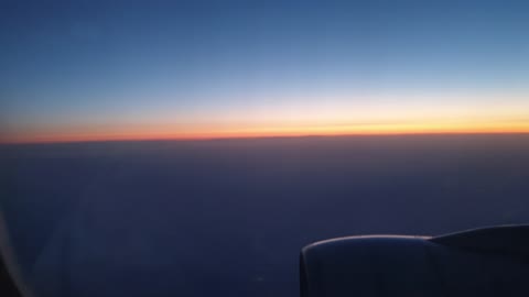 Sunrise from inside the plane