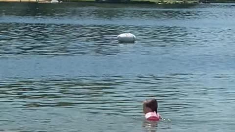 Couple Completely Unconcerned with Other Beach Goers