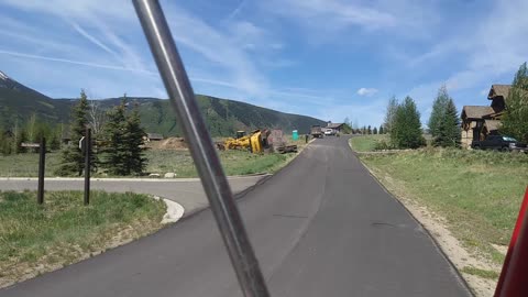 Excavator Slides off Trailer