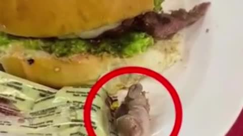 Bolivian woman eats human finger in burger