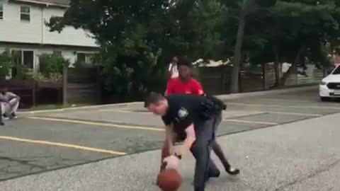 Super cool cop plays basketball with kids