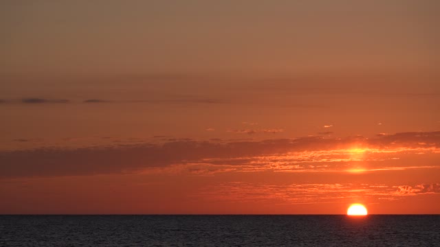 Red sunset, sea and waves 4