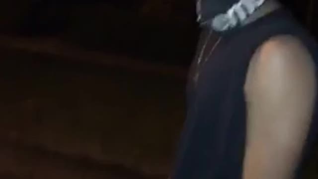 Nsfw guy in black supreme cracks beer on head looks into camera