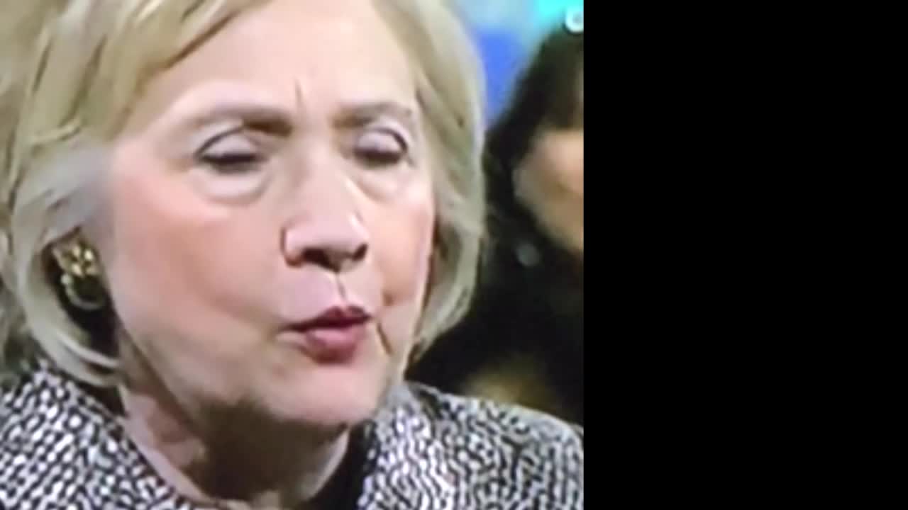 Hillary Clinton with a lizard tongue