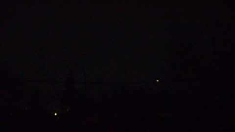 UFO in tree line, one street over